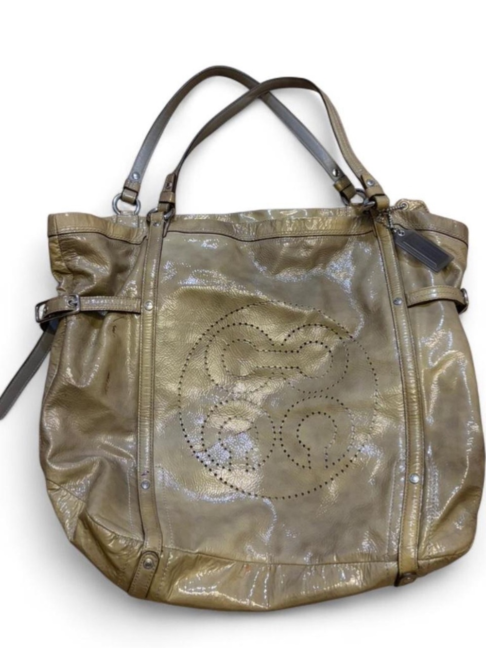 Coach Gold leather tote bag with silver hardware.Has stains on outside of bag!